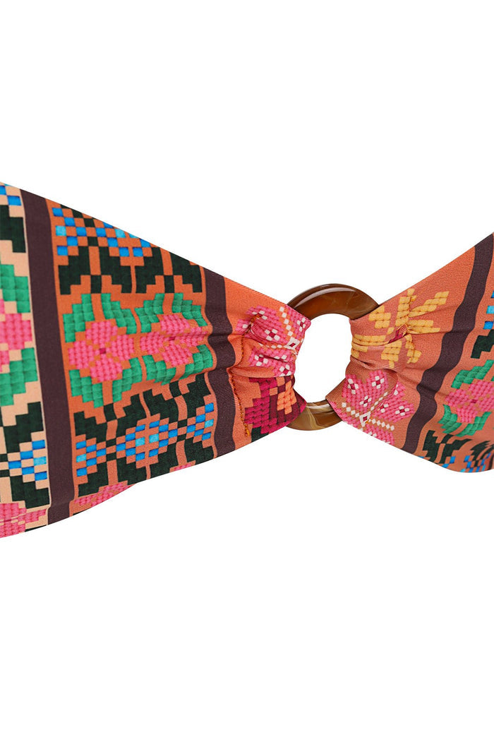 Auriana bandeau bikini top in orange with multicolor pixelated geometric print, gathered front ring detail, and braided straps with colorful bead acc…