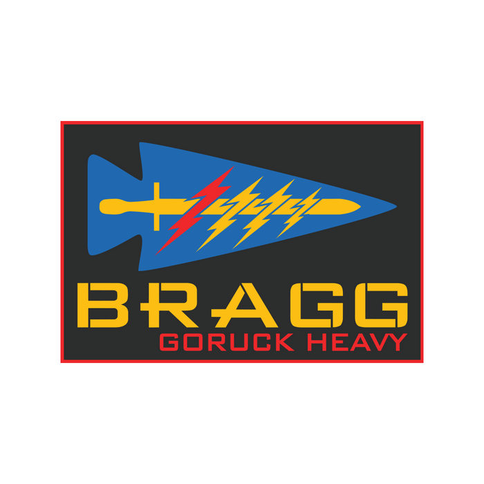 A blue arrowhead with yellow and red lightning bolts, symbolizing Special Forces training, appears above "BRAGG 2027" text on a black background.