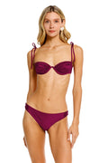 Donna bikini top in deep burgundy with underwire, ruched cups, and adjustable tie straps