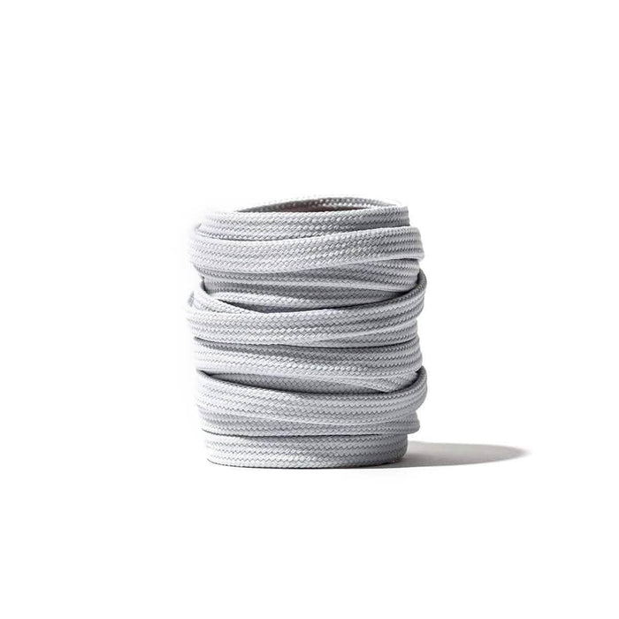 Coiled lunar rock gray rucking shoelaces on white background, GORUCK gear