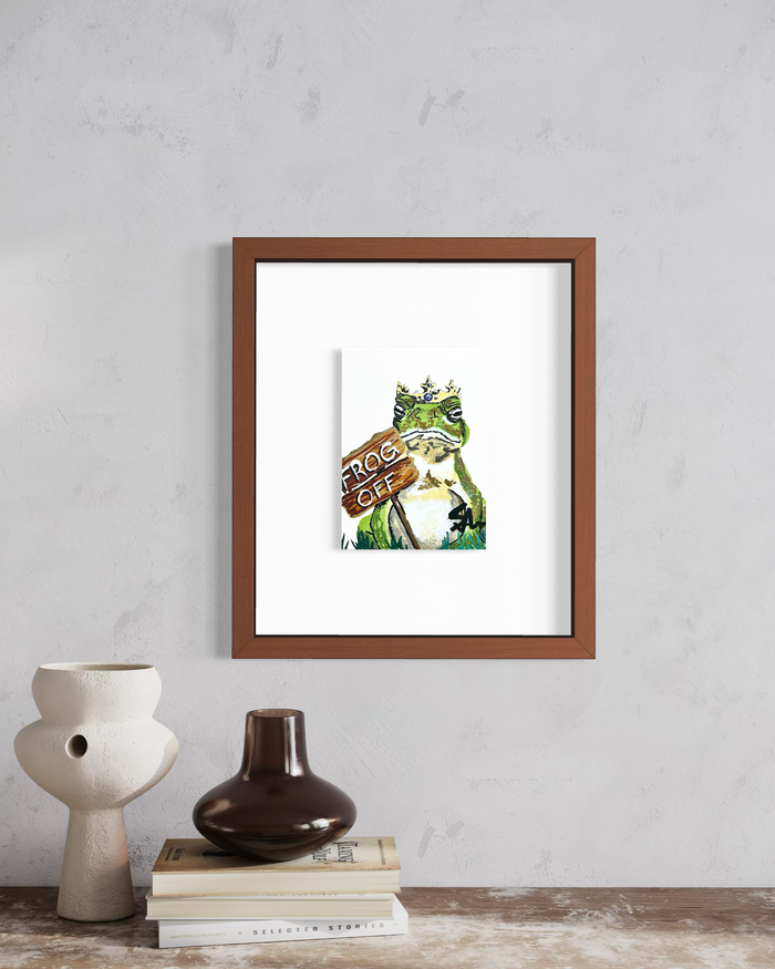 Frog Off 5x7 art print featuring a crowned frog displayed in a framed wall mockup