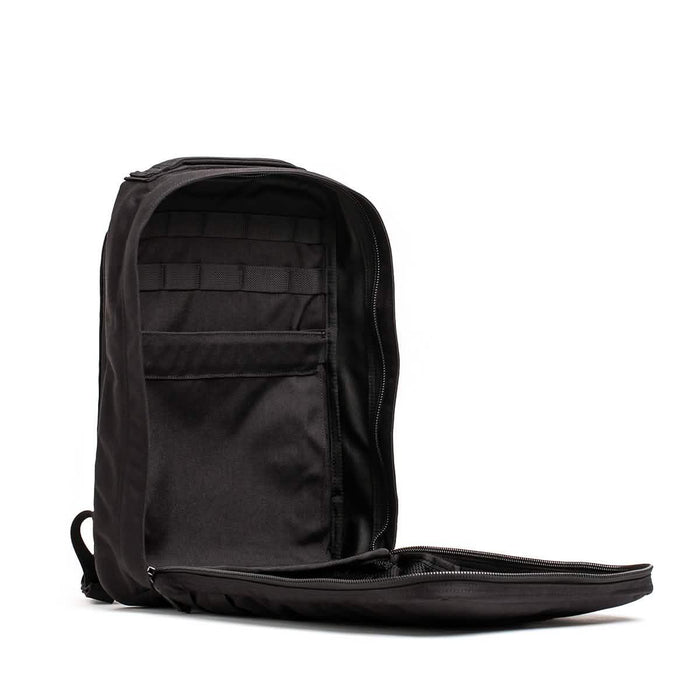 GORUCK black rucking backpack open to show spacious interior and rugged gear compartments