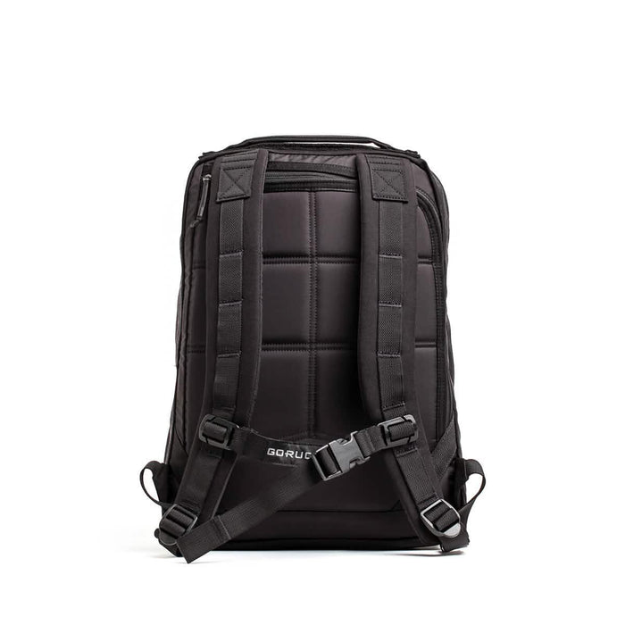 GORUCK black rucking backpack rear view with padded shoulder straps and sternum buckle