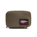 The GR1 Field Pocket - USA is an olive green pouch with a rectangular patch showing a stylized American flag and "GORUCK" in red—ideal as an electronics organizer for your essentials.