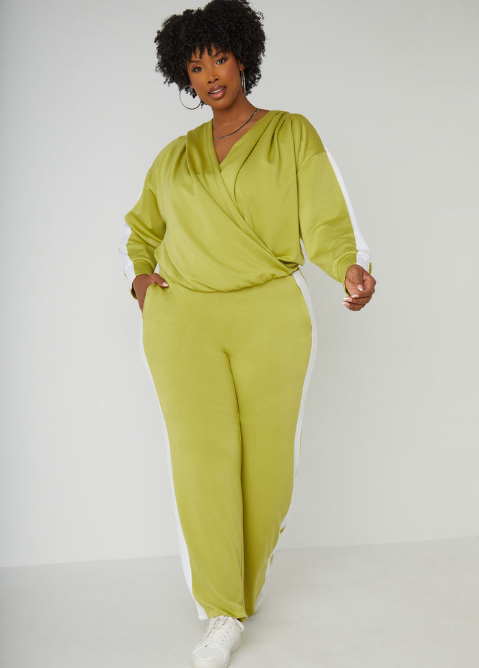 Stretch-knit top with hood, faux wrap neckline and striped trims. Slip-on style. Length: 24in. Can be worn as a two-piece set with matching pants. Pants sold separately.