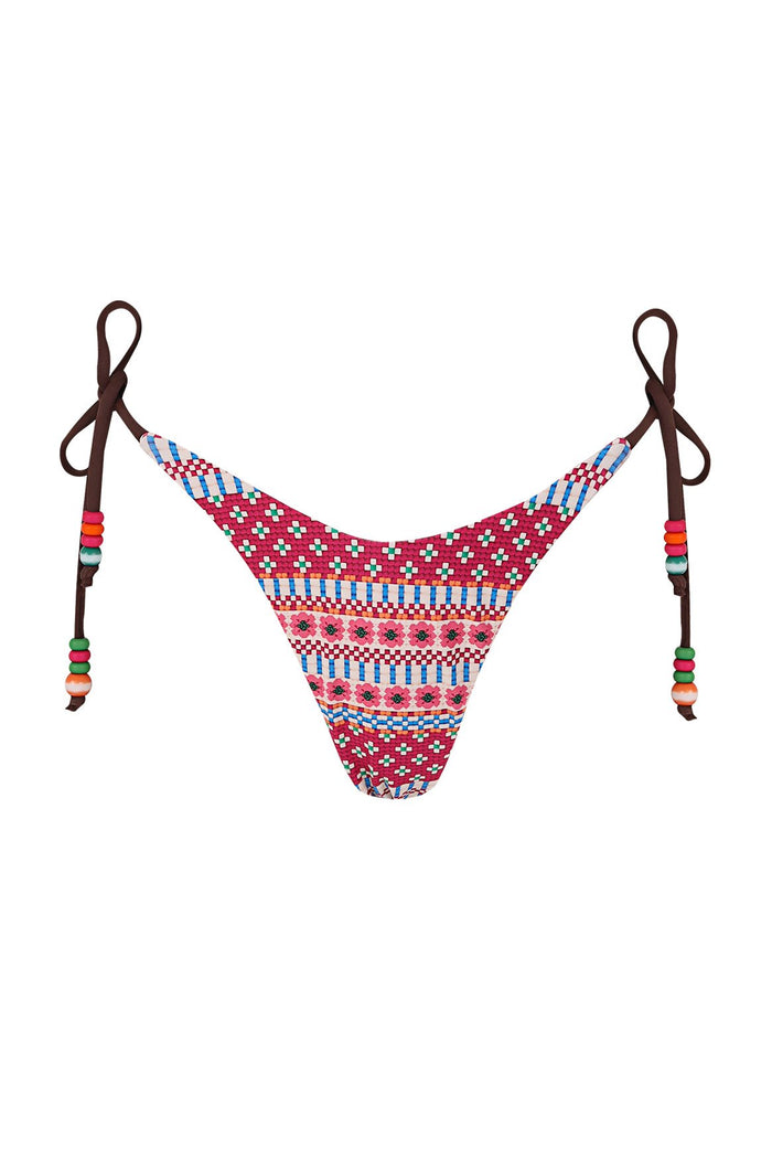 Karmine bikini bottom in multicolor geometric print with checkerboard and striped patterns, side ties with colorful beaded accents