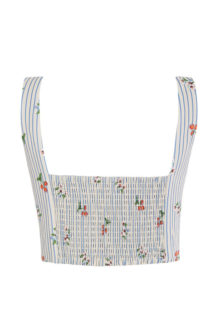 White crop top with blue vertical stripes and smocked bodice, featuring embroidered pattern detail details and orange cherries