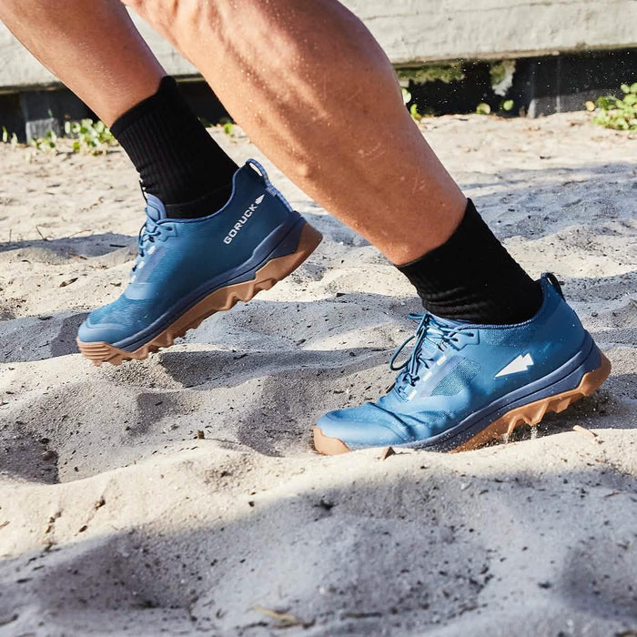 GORUCK blue rucking shoes on sand, durable footwear for outdoor fitness training