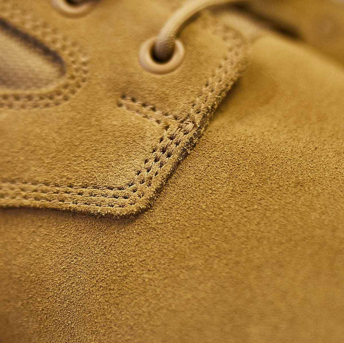 Close-up of GORUCK 8-inch coyote suede boot with reinforced stitching detail