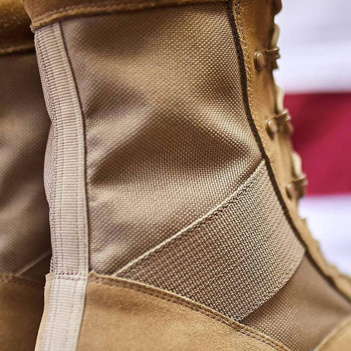 Close-up of GORUCK tan rucking boot with durable fabric and rugged stitching details.