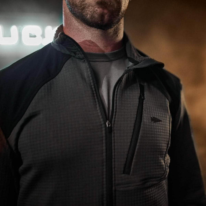 GORUCK Indestructible Grid Fleece Jacket in grey with chest zipper pocket, close-up view