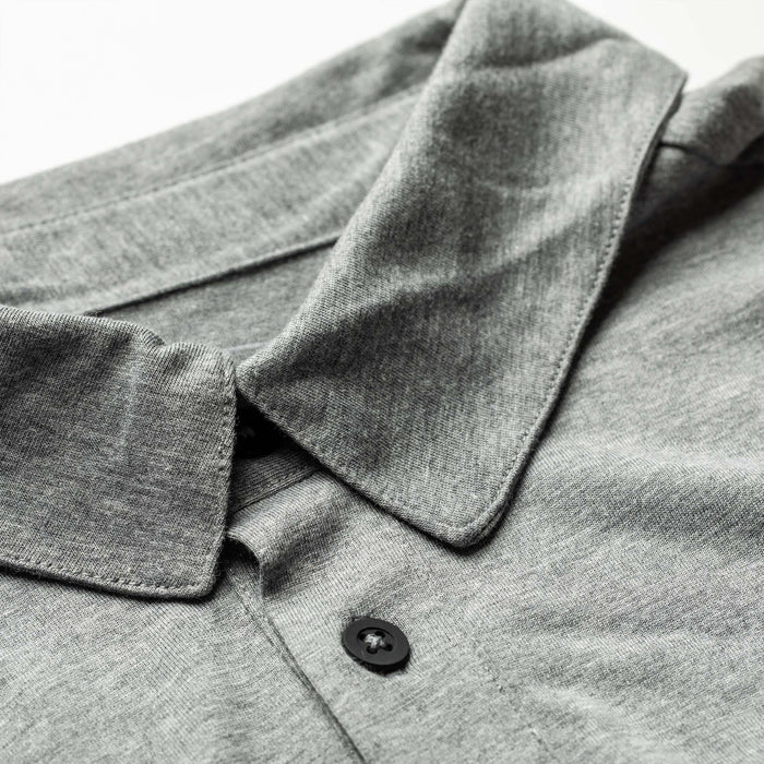 GORUCK men's triblend heather grey polo shirt close-up showing collar and button detail