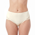 A person models Teri Lingerie’s M108 Beatrice nylon and lace brief in Ivory, featuring a high-waisted full-coverage fit, lace side detailing, and a sewn-in 100% cotton liner; sold as a solid Ivory 3-pack.