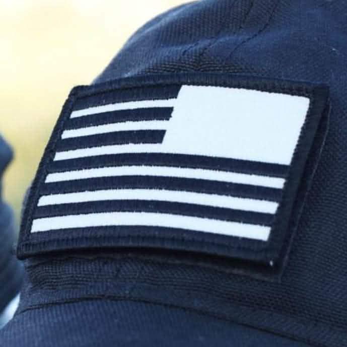 GORUCK embroidered reverse flag patch in black and white on tactical gear