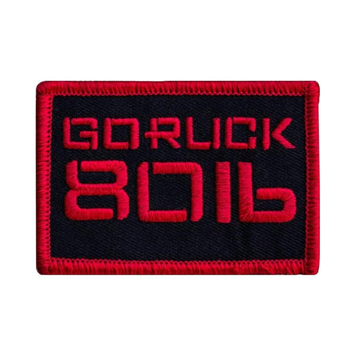 GORUCK embroidered patch with red border and bold red text on black background