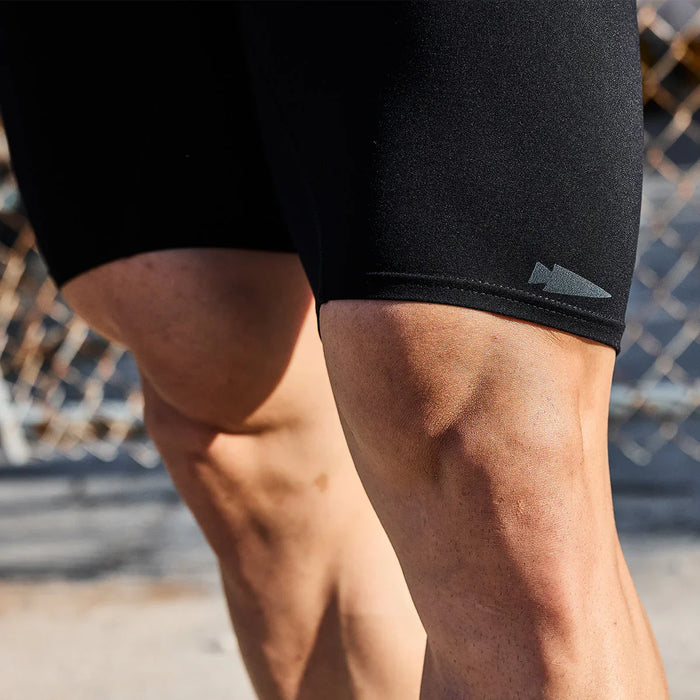 GORUCK compression shorts for rucking, close-up on muscular legs outdoors