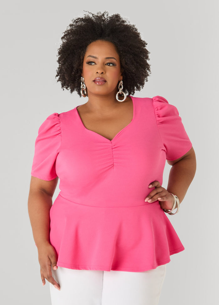 Puff Sleeved Textured Peplum Top