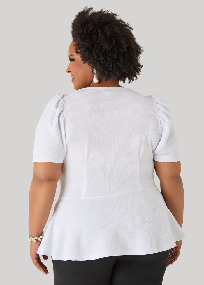 Puff Sleeved Textured Peplum Top