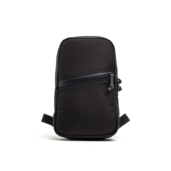 GORUCK black compact ripstop pouch with angled zipper on white background