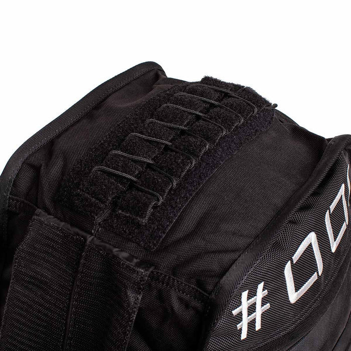 GORUCK 100lb ruck sandbag close-up showing heavy-duty stitching and white embroidered detail