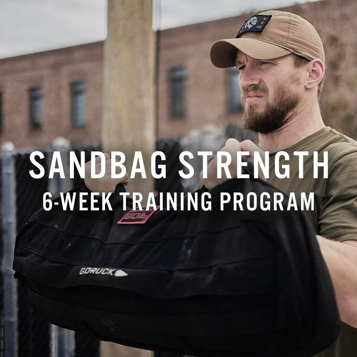 Man lifting GORUCK sandbag outdoors, sandbag strength 6-week training program promo