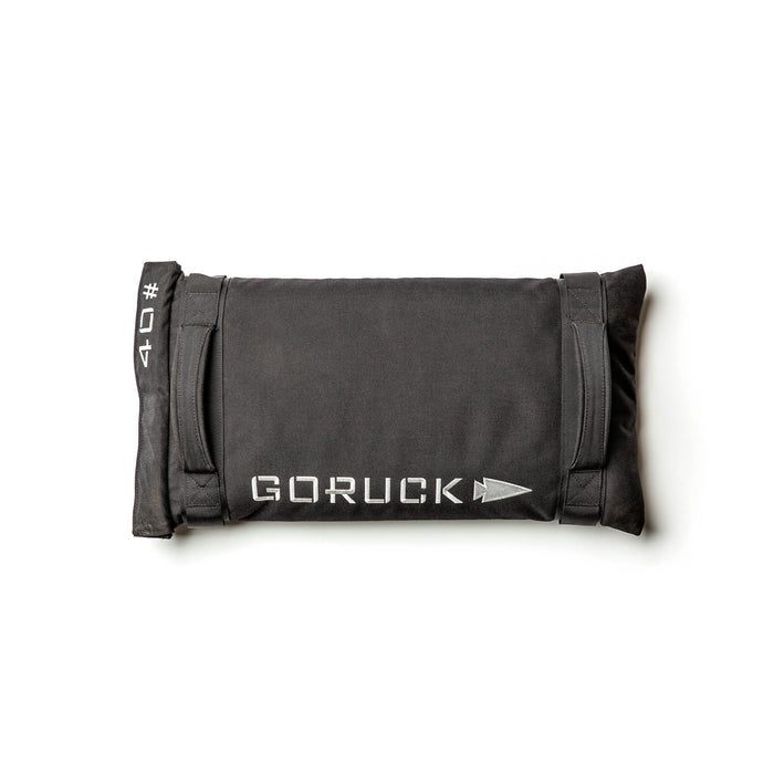 A black Simple Training Sandbags with handles and "40" marked on the end lies on a white background—ideal for sandbag training or as versatile home gym equipment.