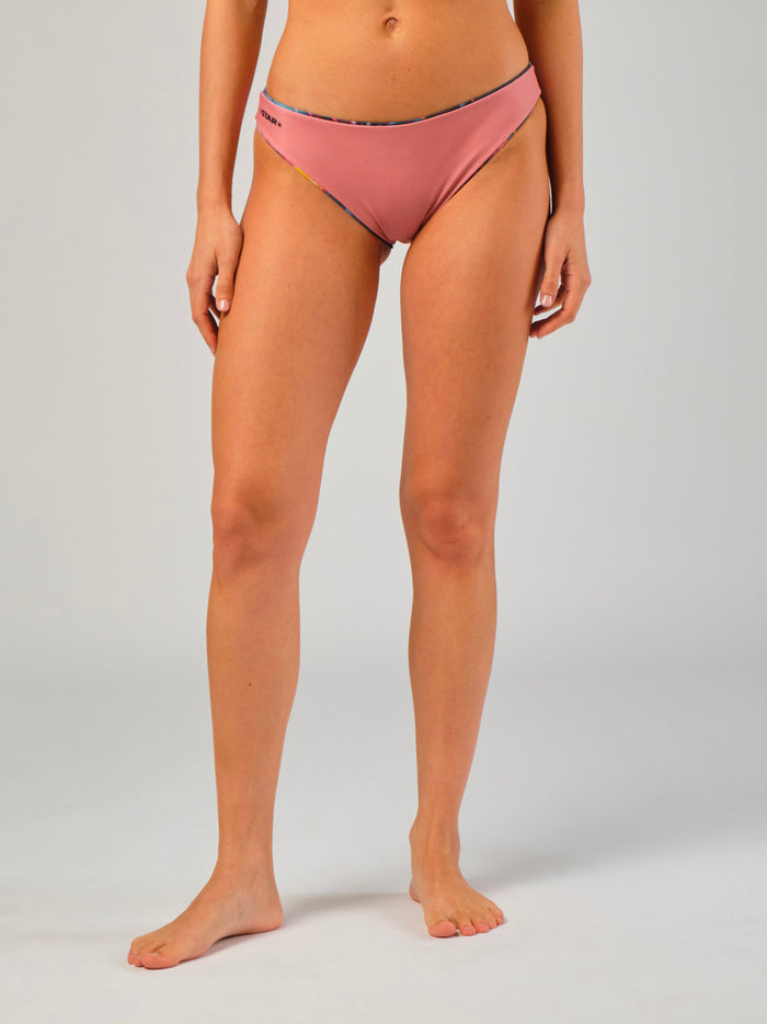 STAR Vega Reversible Icon Trunks showing both sides of the 2-in-1 athletic beach volleyball briefs.