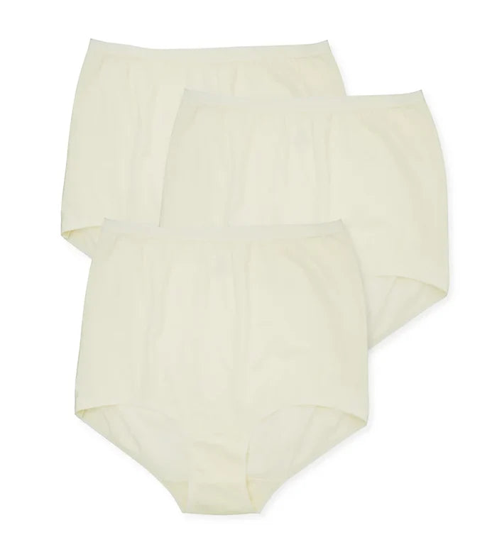 Three pairs of The Classic Betsy (M100) high waist cotton briefs by Teri Lingerie in Buttercream are arranged overlapping on a white background, offering full coverage comfort and a modest fit.