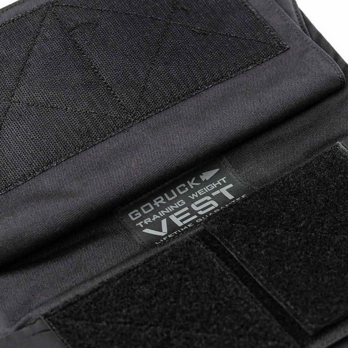 A close up of the Training Weight Vest - Black, featuring an adjustable design.