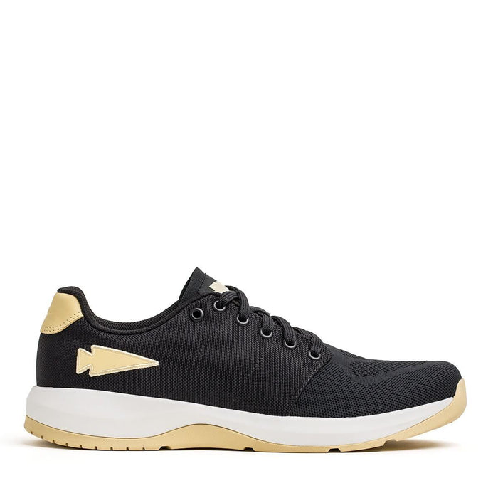 GORUCK black rucking shoe with gold accents, white sole, side profile on white background