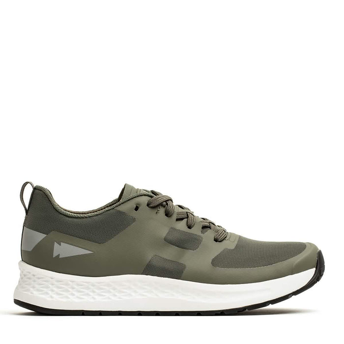 The Women's Rough Runner - Earth by GORUCK is an olive green athletic sneaker ideal for the Rough Runner, featuring a white and black sole with an EVA midsole. It includes a lace-up design, subtle side branding, and a textured gradient density midsole for enhanced comfort.